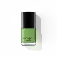 A bottle of Liberation Nails non-toxic nail polish in a cool, rich green color, Earth Sign.