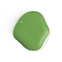 A droplet of Liberation Nails non-toxic nail polish in a cool, rich green color, Earth Sign.