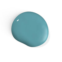 A droplet of Liberation Nails nail polish in a soft-yet-strong teal color, Future Surf.