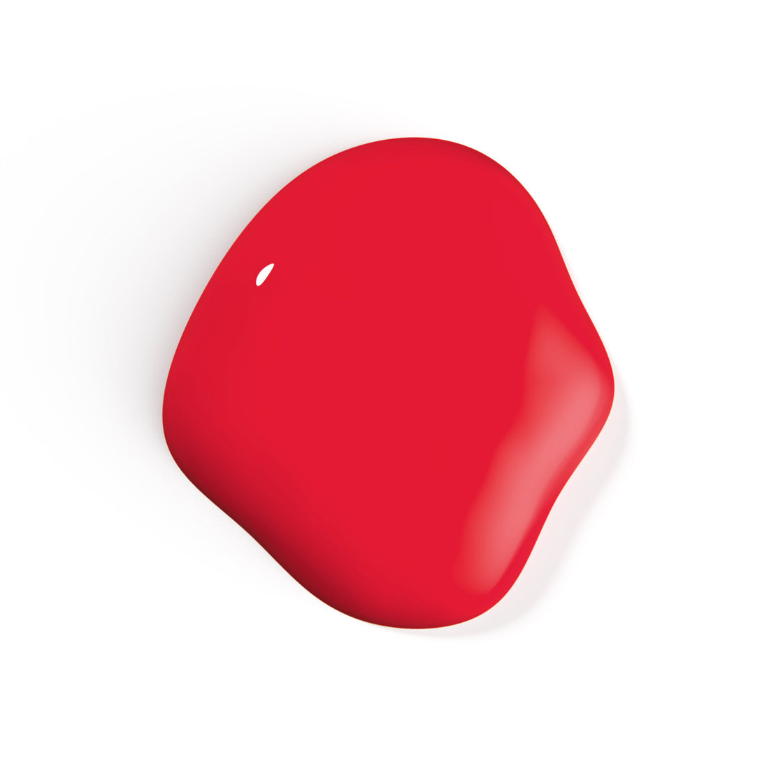 A droplet of Liberation Nails 21-free nail polish in a bold punchy red with a hint of orange color, Arrival