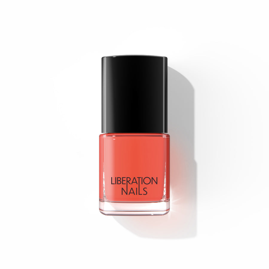 A bottle of Liberation Nails nail polish in a terracotta, melon, coral color, Better Mood.