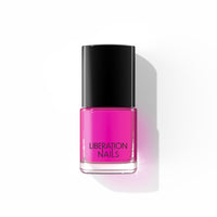 A bottle of Liberation Nails vegan nail polish in a neon pink color, Chroma.
