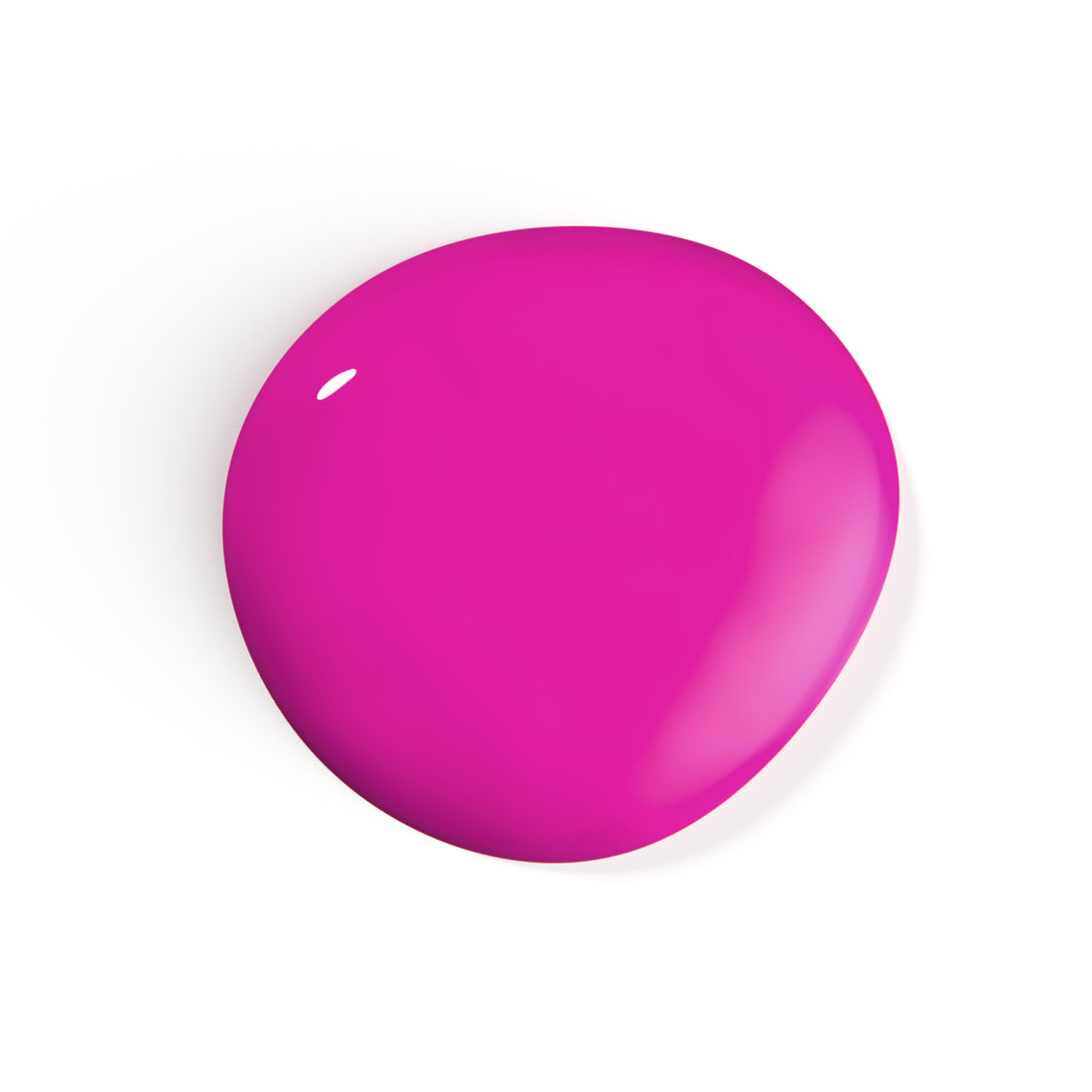A droplet of Liberation Nails vegan nail polish in a neon pink color, Chroma.