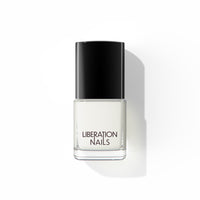 A bottle of Liberation Nails nail polish in a soft creamy white color, Light Worker.