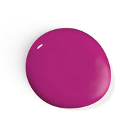 A droplet of Liberation Nails nail polish in a rich berry magenta color, The Fave